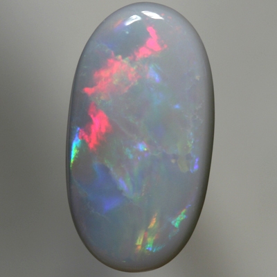 SOLID SEMI BLACK OPAL Bright reds to peacock fire with gold